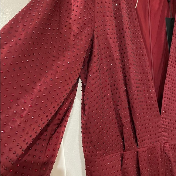 Embellished shoulder pad jumpsuit never worn with tags. - Picture 2 of 4